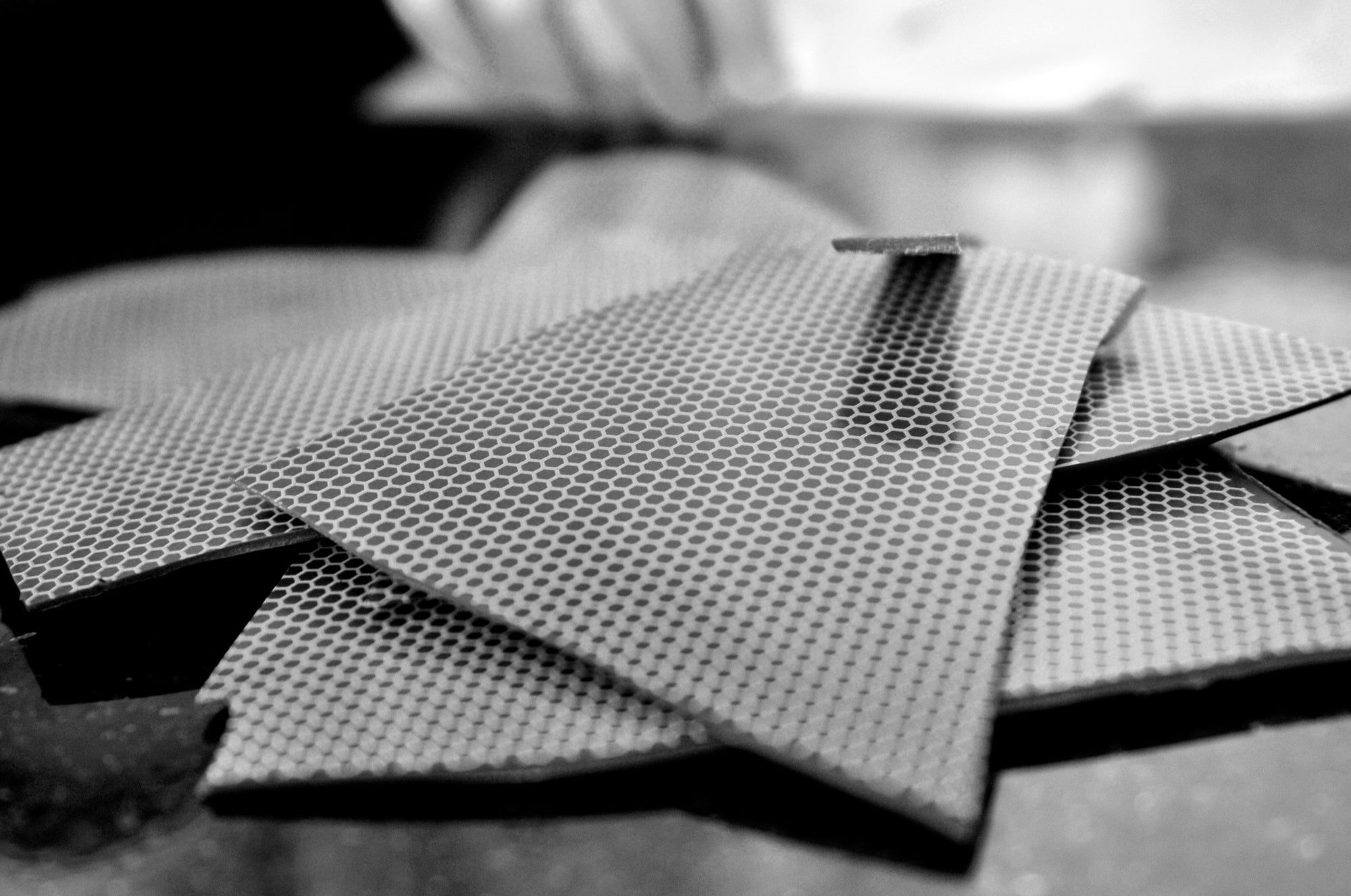 Black & White Image of Honey Chocolate Shards by Crofts Chocolates.