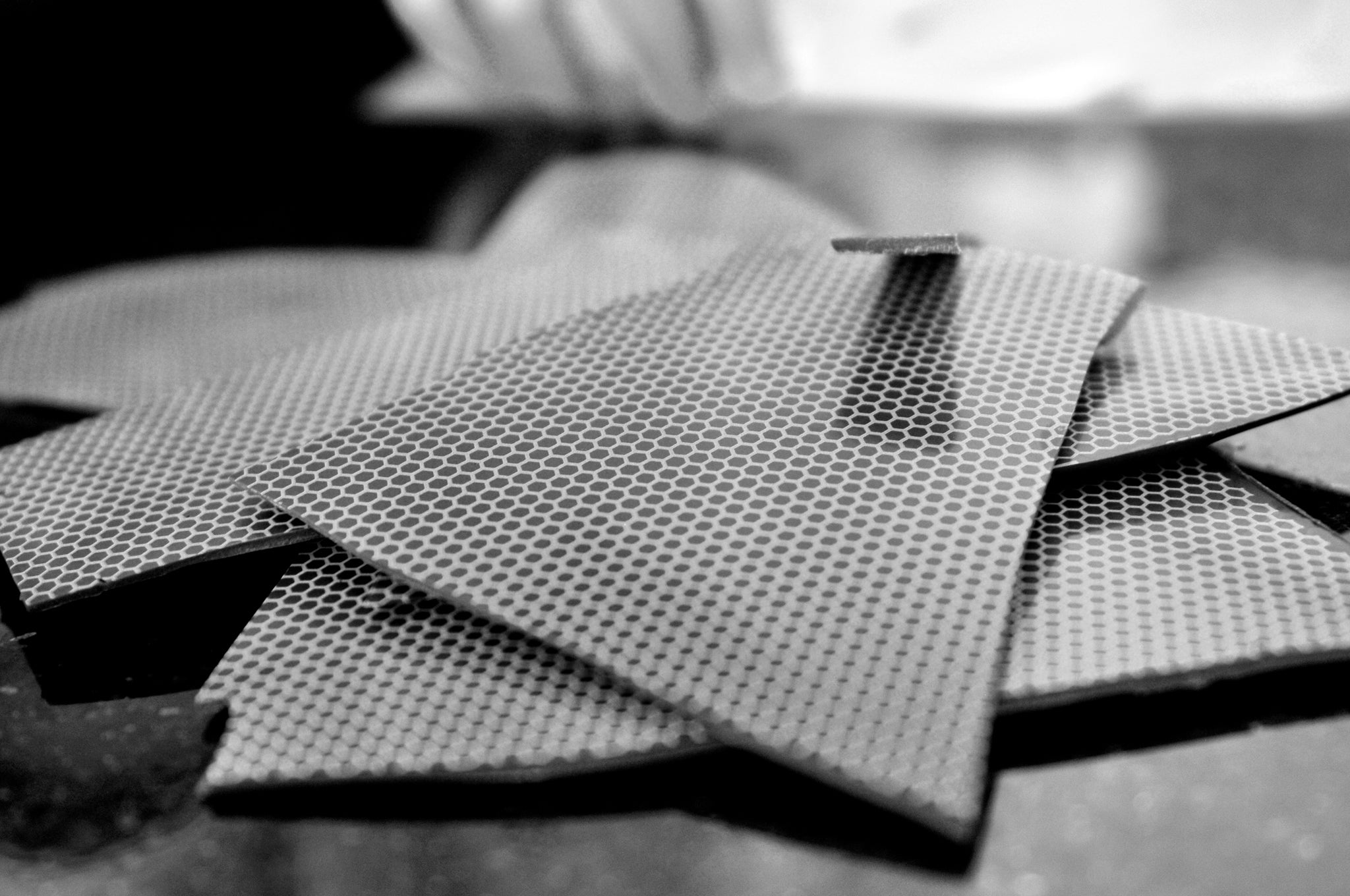 Black & White Image of Honey Chocolate Shards by Crofts Chocolates.