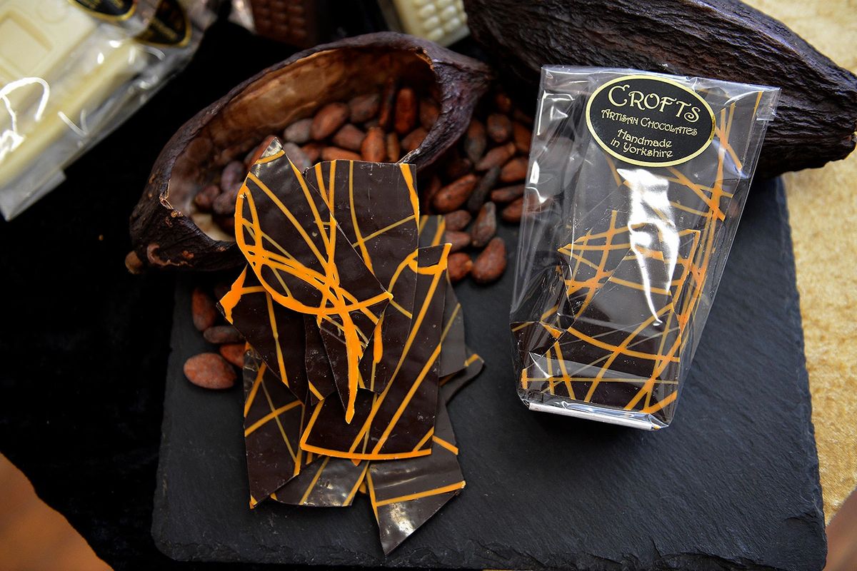 Decorative orange lines enhancing the Orange Chocolate Shards