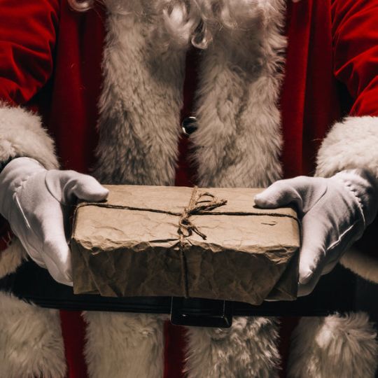 Santa with present