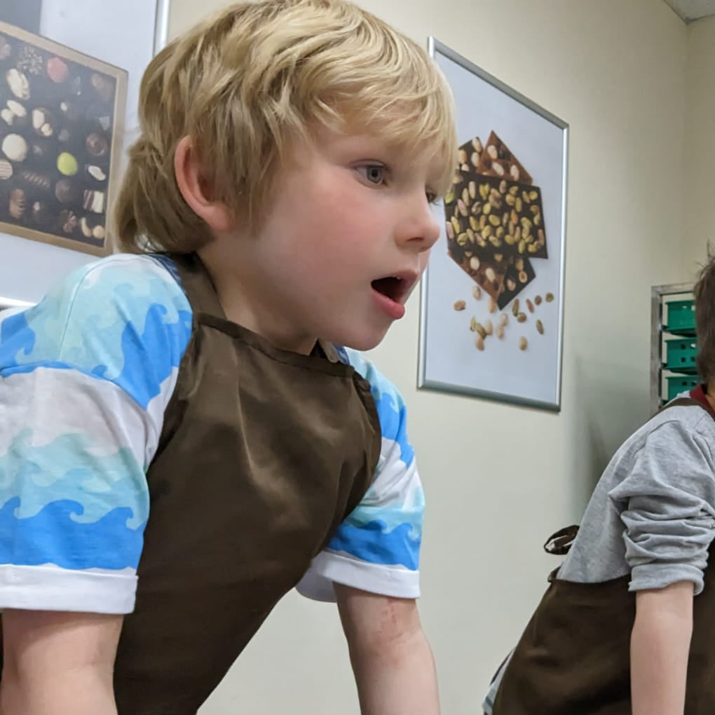 Fascinated child learning about chocolate