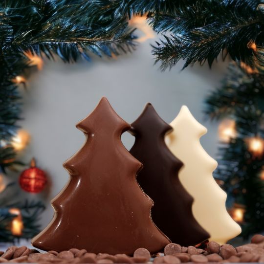 Handcrafted Belgian chocolate Christmas tree, measuring 11cm by 10cm, available in milk, dark, and white chocolate variations